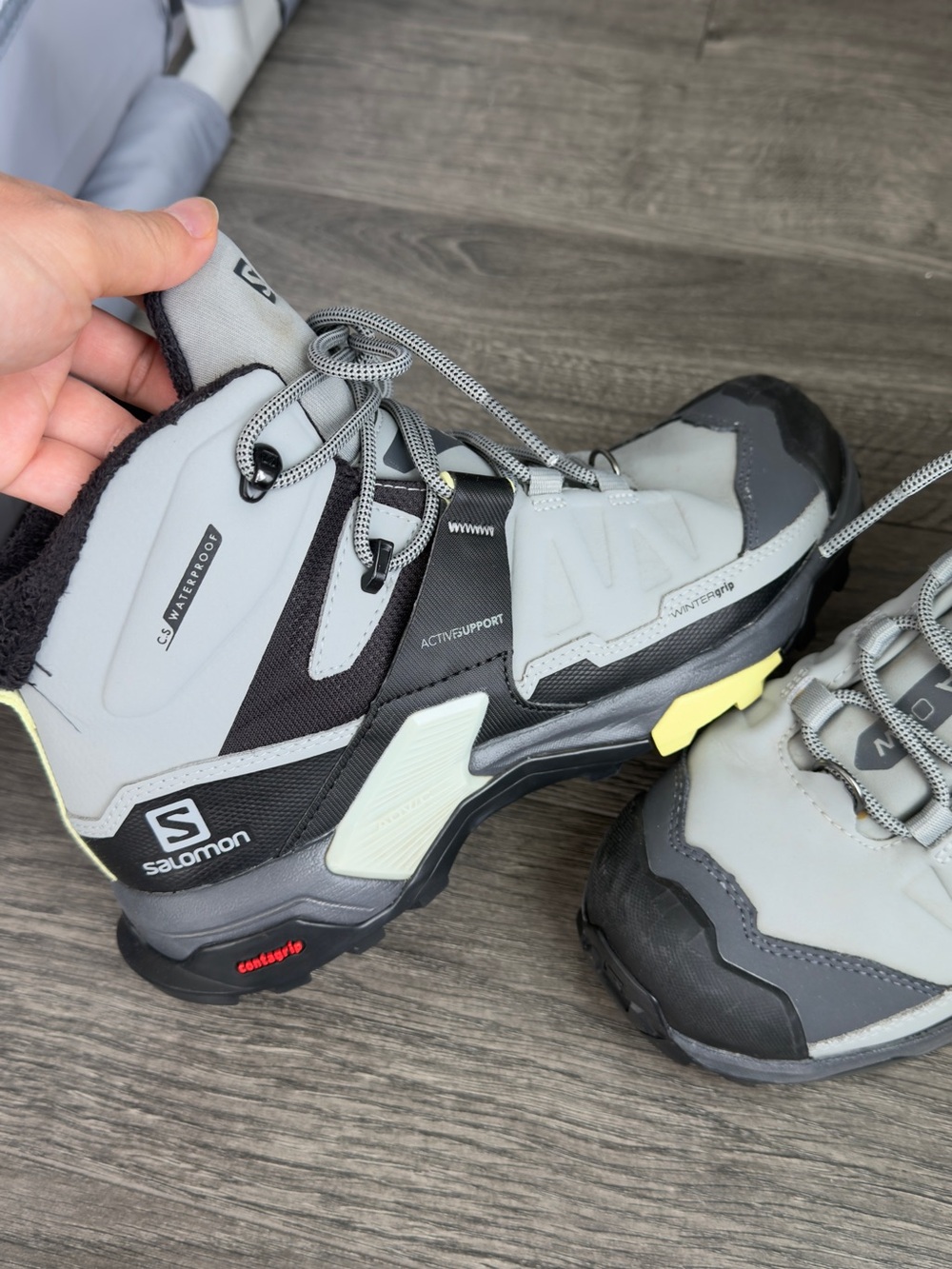 Salomon Men's Light Gray and Black Waterproof Hiking Boots with Yellow Accents
